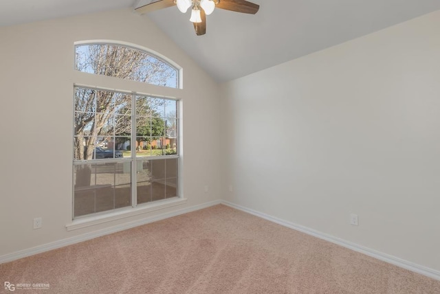 carpeted spare room with vaulted ceiling with beams and ceiling fan