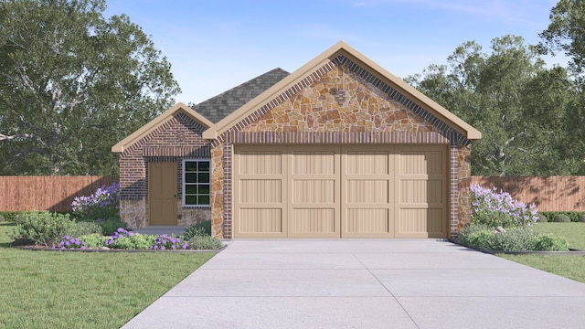 view of front facade with a garage and a front lawn