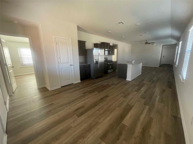 kitchen featuring appliances with stainless steel finishes, dark hardwood / wood-style flooring, ceiling fan, and dark brown cabinetry