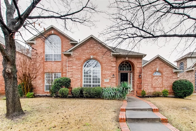 view of property featuring a front yard