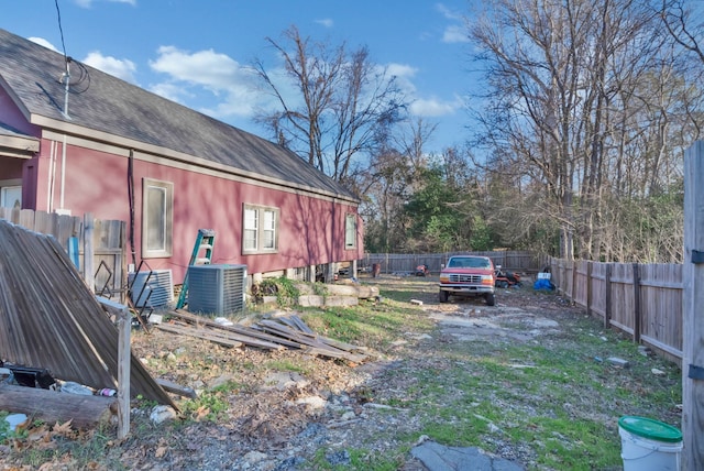 view of yard featuring central AC unit