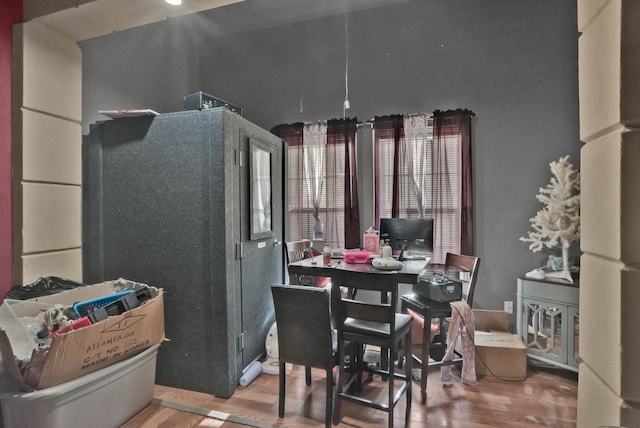 dining area with hardwood / wood-style floors