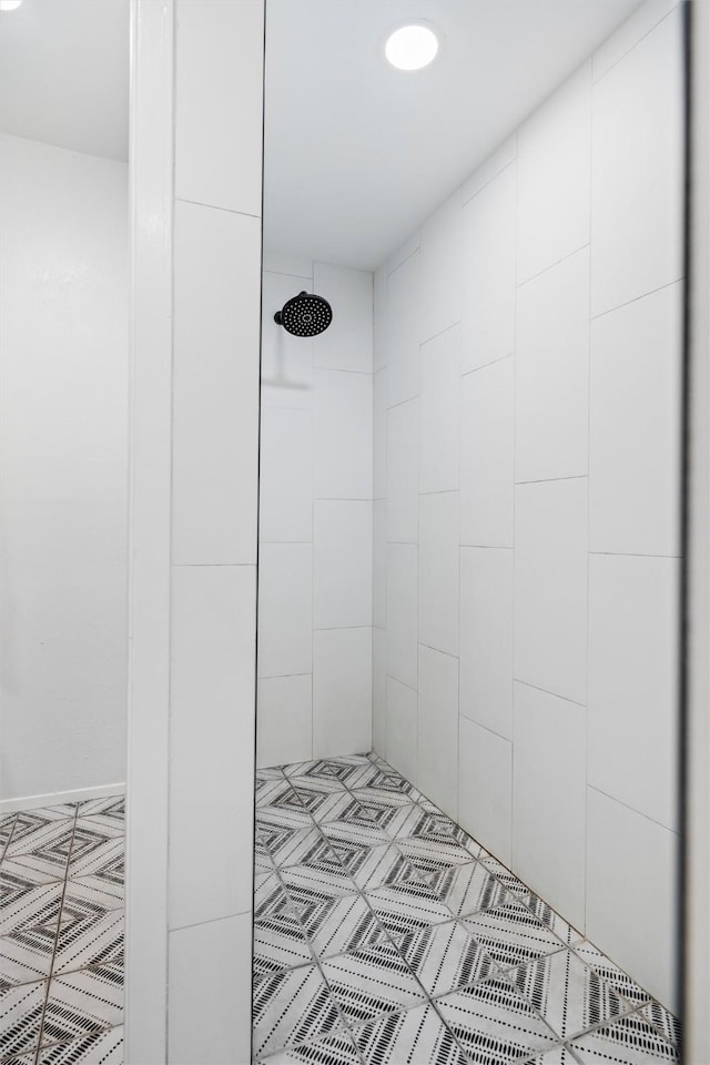 full bathroom with a tile shower