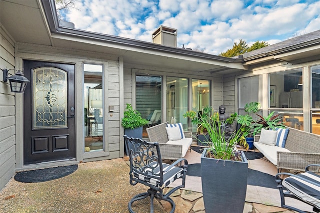 exterior space featuring an outdoor hangout area