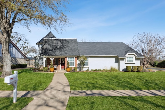 view of front of home with a front yard