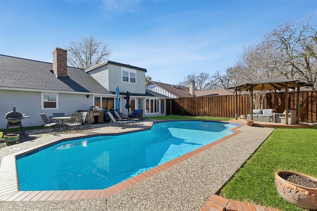 view of swimming pool featuring outdoor lounge area and a patio