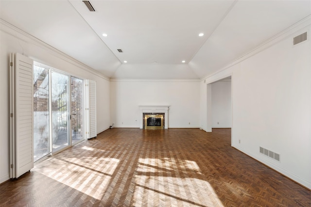 unfurnished living room with ornamental molding, lofted ceiling, a premium fireplace, and dark parquet floors