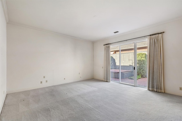 unfurnished room with light colored carpet and ornamental molding