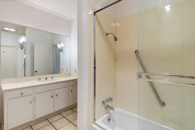 bathroom featuring vanity, tile patterned flooring, and tub / shower combination