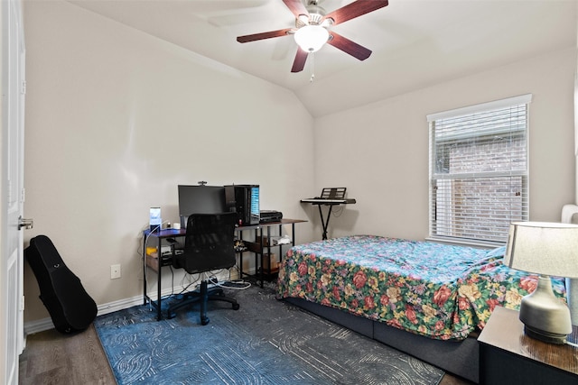 bedroom with ceiling fan, wood-type flooring, and lofted ceiling