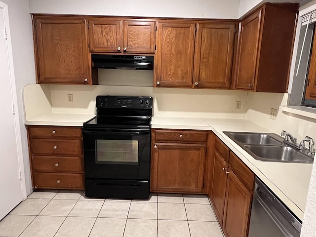 kitchen with stainless steel dishwasher, light tile patterned floors, sink, and black electric range