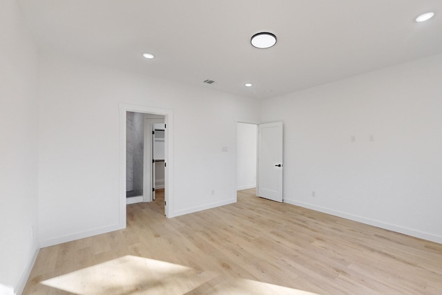 unfurnished bedroom featuring light wood-type flooring