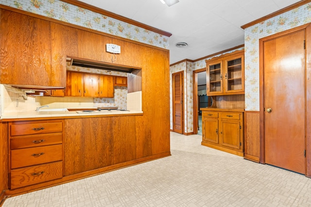 kitchen with backsplash and ornamental molding