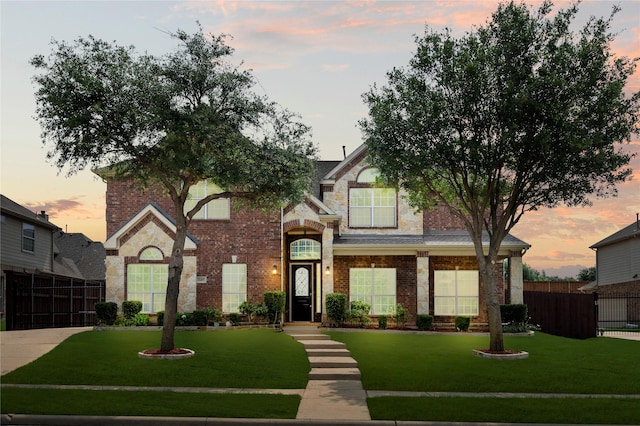 view of front of home featuring a yard