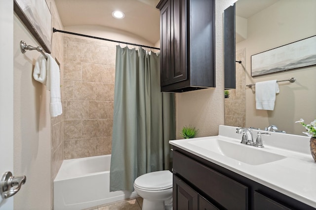 full bathroom featuring vanity, toilet, and shower / tub combo