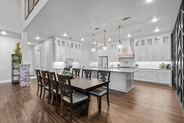 dining area with dark wood-type flooring