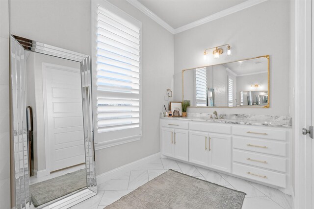 bathroom with vanity, crown molding, and a wealth of natural light