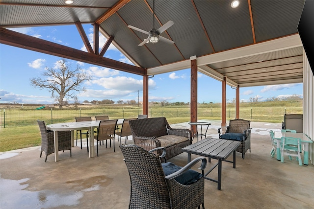 view of patio with a rural view, a gazebo, and ceiling fan