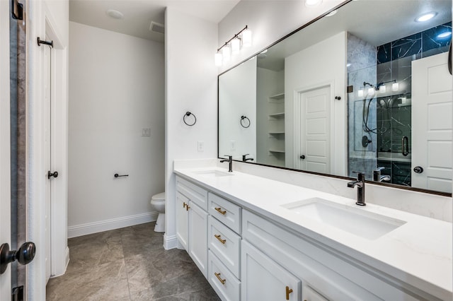 bathroom with walk in shower, vanity, and toilet