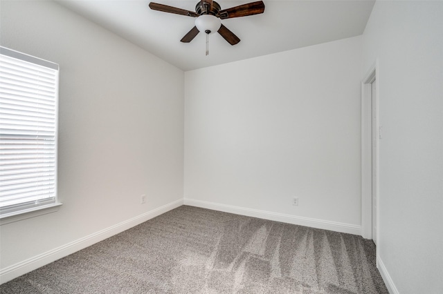 empty room with carpet floors and ceiling fan