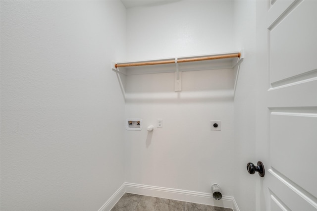 clothes washing area with electric dryer hookup, washer hookup, and hookup for a gas dryer