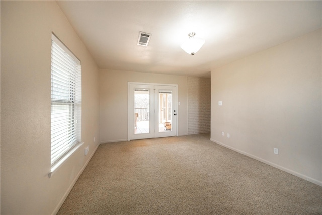 view of carpeted spare room