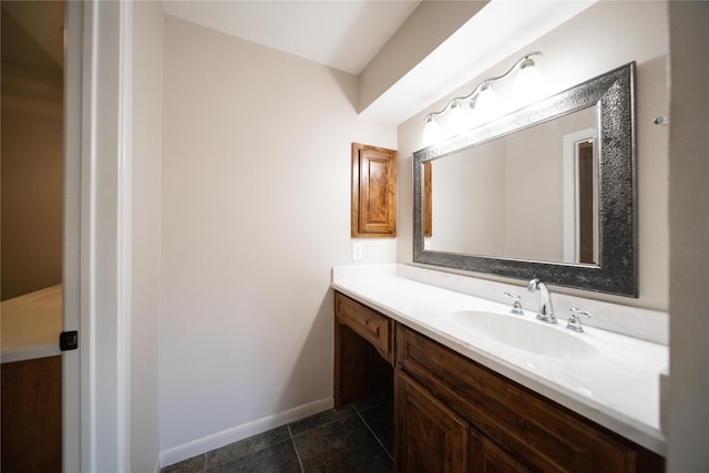 bathroom with tile patterned flooring and vanity