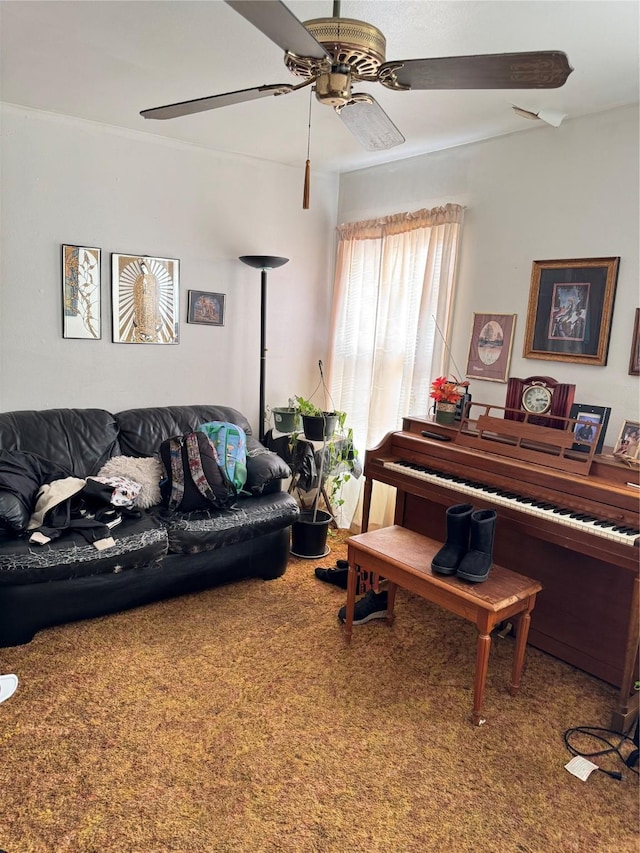 living room featuring carpet flooring and ceiling fan