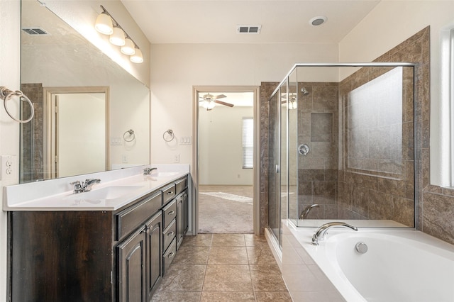 bathroom with vanity, shower with separate bathtub, and tile patterned floors