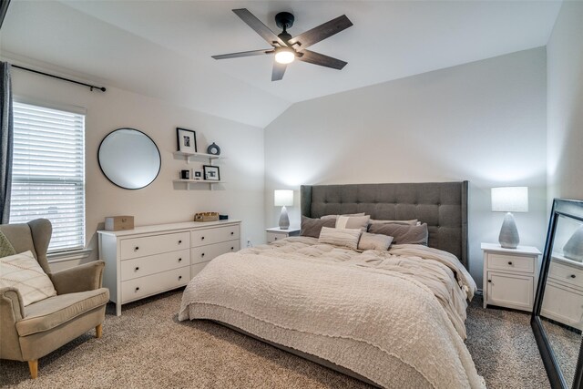 carpeted bedroom with lofted ceiling and ceiling fan