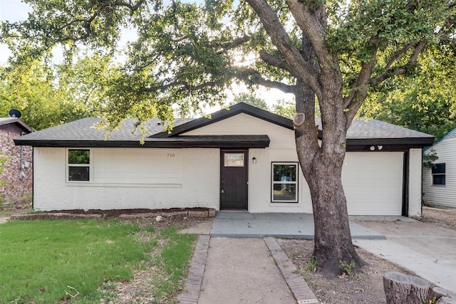 ranch-style house with a garage