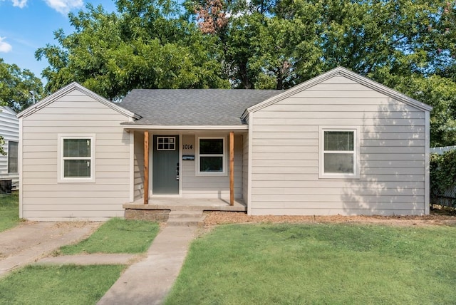 view of front of home featuring a porch and a front lawn