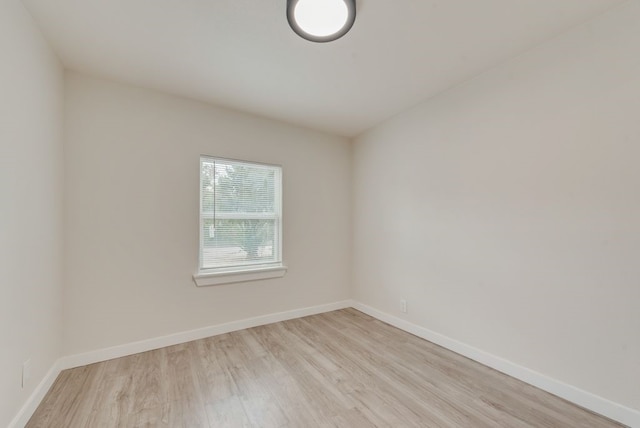 empty room featuring light hardwood / wood-style floors