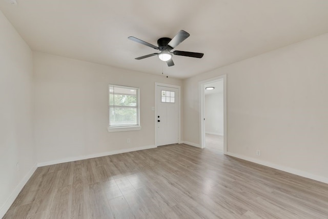 interior space featuring light hardwood / wood-style floors and ceiling fan