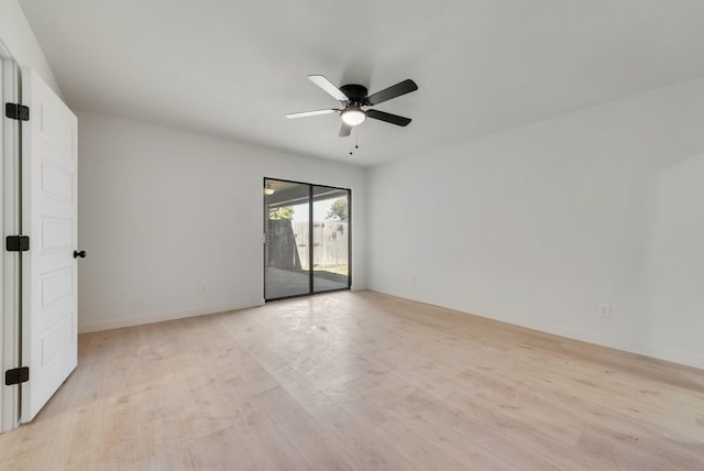 empty room featuring light hardwood / wood-style flooring and ceiling fan