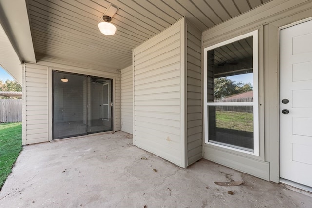 doorway to property with a patio area