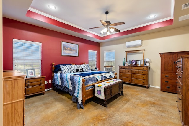 carpeted bedroom featuring a raised ceiling, crown molding, and an AC wall unit