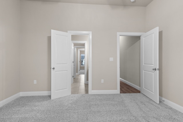 175 Quail Ridge Ct, Decatur, TX 76234 - unfurnished bedroom with carpet flooring and baseboards