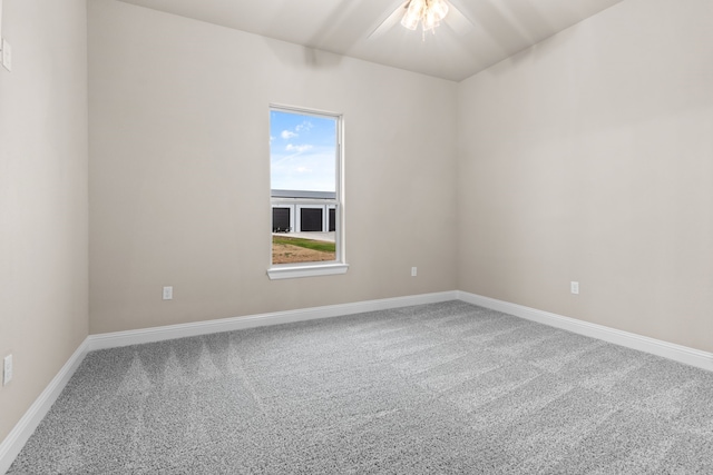 spare room featuring carpet flooring