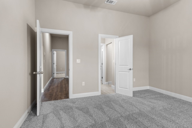 unfurnished bedroom featuring carpet floors