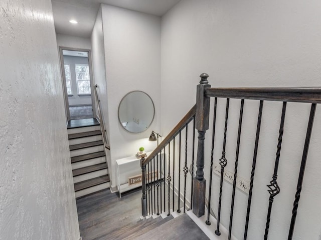 stairway with wood-type flooring