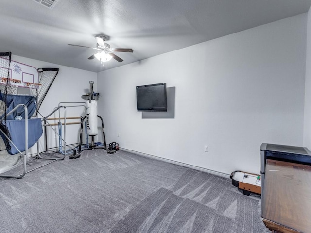 exercise room featuring carpet flooring and ceiling fan