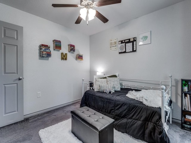 bedroom featuring ceiling fan and carpet floors