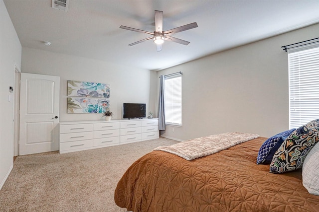 bedroom featuring ceiling fan and carpet floors