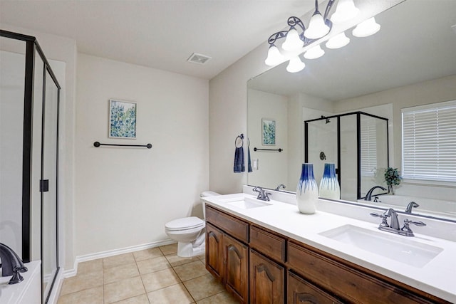 full bathroom with plus walk in shower, an inviting chandelier, tile patterned flooring, toilet, and vanity