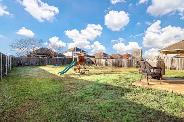 view of yard with a playground