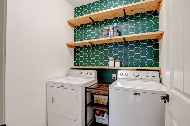 laundry area with washer and clothes dryer