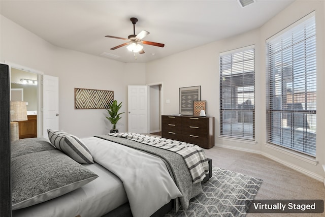 carpeted bedroom with ceiling fan