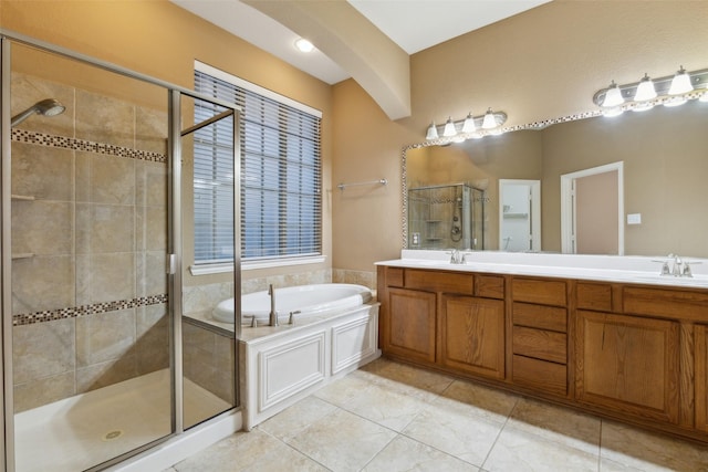 bathroom featuring vanity, tile patterned floors, and plus walk in shower