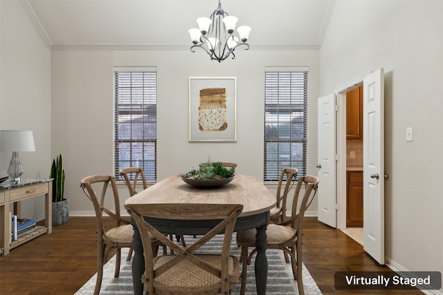 dining space featuring ornamental molding, dark wood-type flooring, and a wealth of natural light